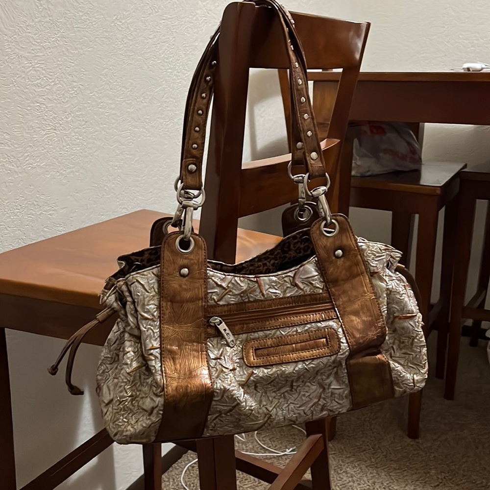 M.C. Metallic purse